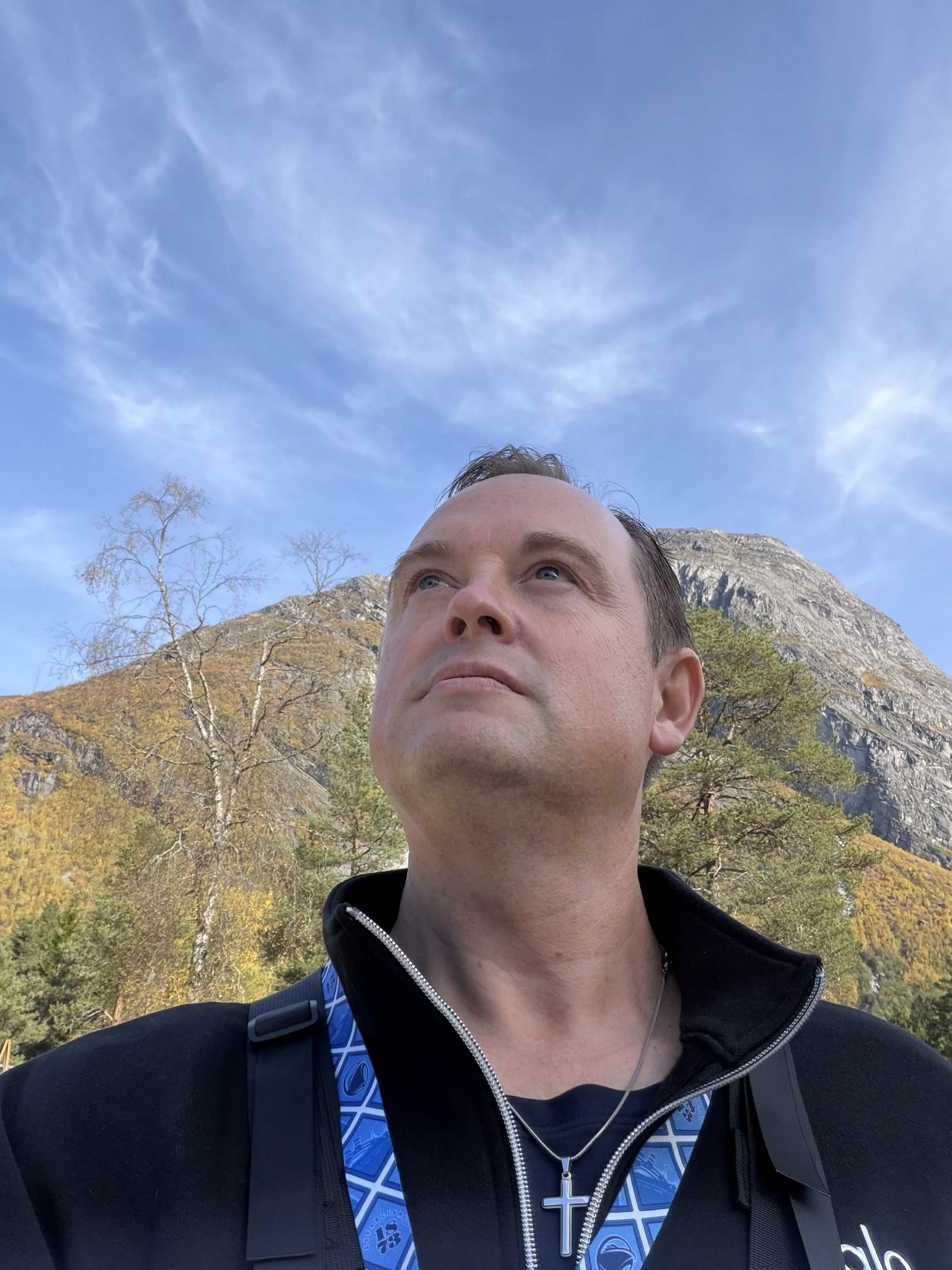 A mountain in Norway. Autumn in the birch. Eyes up the rock, and past it.